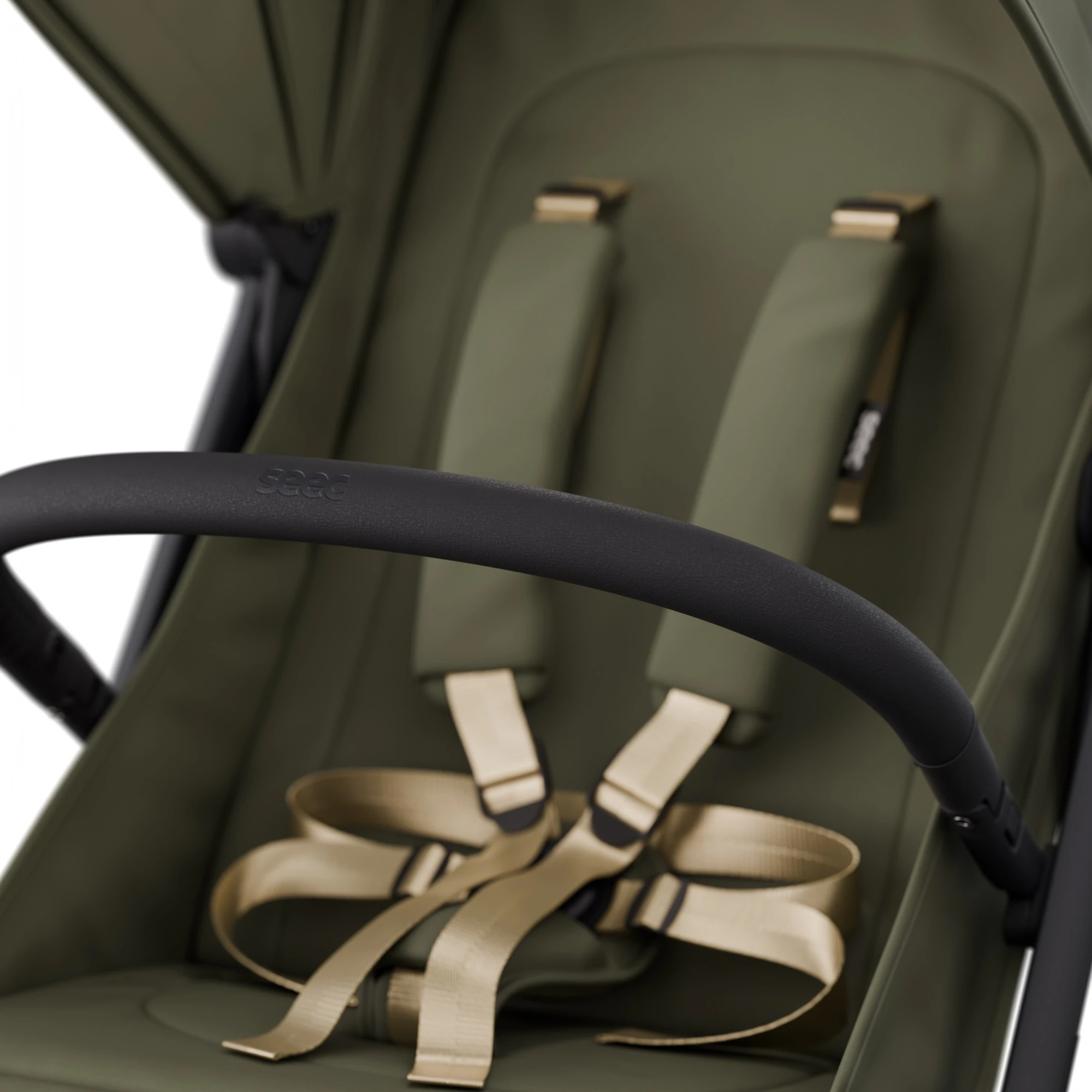 Close-up render of the Nano 5 seat in olive green with its beige harness.